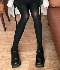 Black velvet pantyhose 80D tights leg wear detail view showing smooth texture and autumn style
