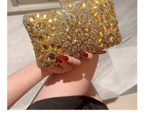 Elegant rhinestone evening clutch bag with sparkling crystals for parties and weddings.