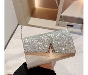 Sparkling rhinestone evening bag with metallic chain strap and chic geometric clasp for parties.
