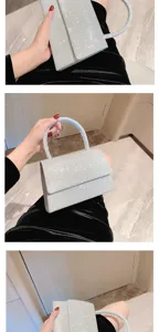 Detailed view of the sparkling sequin evening handbag, featuring a chic flap and top handle.