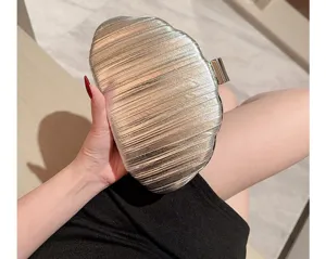 Silver pleated clutch bag for women, elegant evening party purse with metal clasp closure.