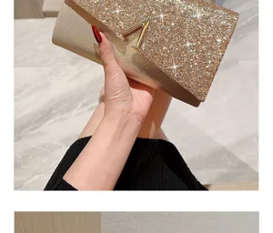 Detailed shot of a shimmering gold glitter evening clutch bag with chic metal V hardware.