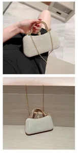 Elegante glitter clutch tas met gouden metalen frame en ketting voor avondfeestjes.