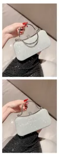 Glitter avondtasje detail met sprankelende diamanten dubbele ringhandgreep en metalen sluiting.