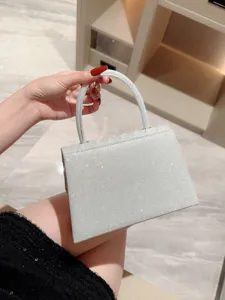 Silver sparkly evening bag for women, elegant rhinestone square handbag and clutch purse.
