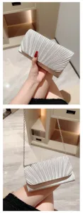 Silver pleated evening clutch bag with metal chain strap, elegant shoulder bag for women party.