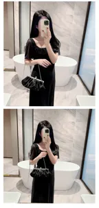 Elegant black satin evening clutch bag with crystal clasp and chain for formal party dress.
