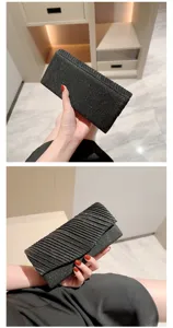 Elegant black glitter pleated clutch bag for evening parties, weddings and banquets.