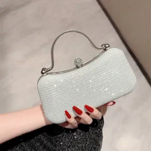 Zilveren glinsterende strass avondtas handtas met metalen handvat voor feest en bruiloft.