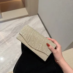 Shimmering evening clutch bag for women, elegant glitter envelope handbag for party dress.