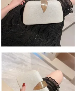 Elegant evening clutch bag for women, featuring a chic gold leaf clasp and shimmering finish.