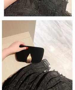 Elegant black velvet evening clutch bag with gold leaf decor, perfect for banquets and parties.