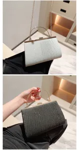 Elegant pleated glitter evening bag with metal handle and stylish chain strap for women.