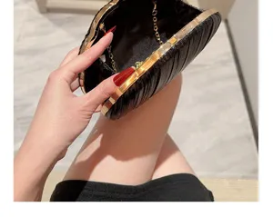 Elegant black leather pleated evening clutch bag with metal frame and chain for women party dress