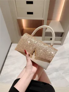 Elegant glitter evening bag for women, sparkly clutch purse with gold handle for party.