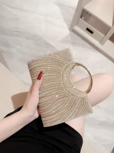 Borsa da sera scintillante in strass con manico tondo in metallo per matrimoni.