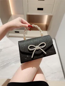Élégant sac de soirée noir scintillant avec nœud en strass et poignée torsadée pour femmes