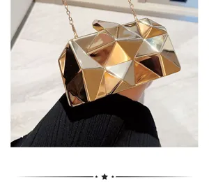 Metallic geometric clutch evening bag with chain strap for women parties and weddings.