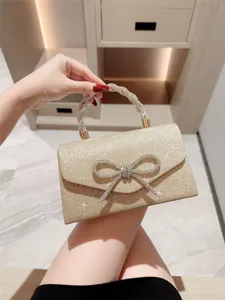 Élégant sac de soirée nœud strass doré pochette de fête luxueuse poignée cristal brillant