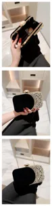 Close-up details of black velvet evening clutch with sparkling rhinestones and gold chain.
