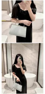 Silver pleated evening clutch bag for women, elegant shining handbag for parties and banquets.