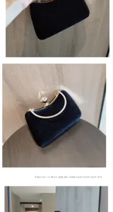 Black velvet evening clutch bag with gold chain handle and crystal clasp for women formal dress.