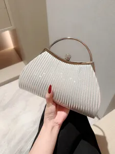 Elegant pleated evening clutch bag with metallic ring handle and rhinestone clasp for women