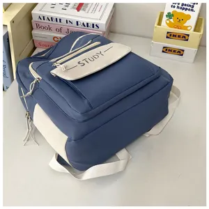 Korean style casual large capacity student backpack, blue and white color block, durable.
