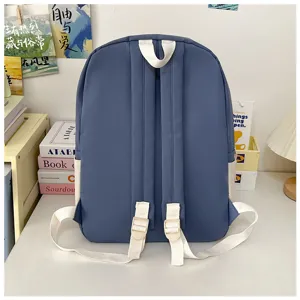 Casual student school backpack in blue with white straps, perfect for daily wear.