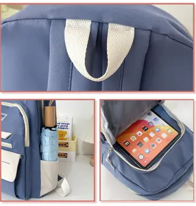 Casual blue student backpack with large capacity, waterproof fabric, ideal for school and daily use.