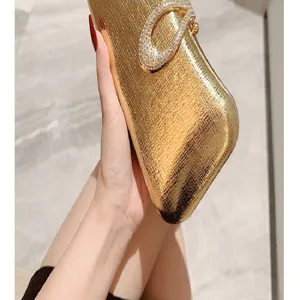 Luxury gold texture leather evening clutch bag with stunning rhinestone teardrop clasp.