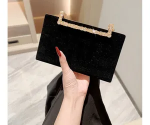 Elegante schwarze Samt-Abendtasche, verziert mit einem glitzernden Strass-Metallgriff.