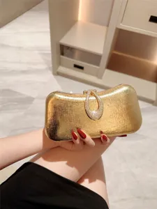 Elegant gold metallic evening clutch bag with sparkling rhinestone diamond clasp for women party.