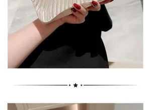 Detailed shot of the elegant pleated satin evening clutch bag, showing exquisite texture.