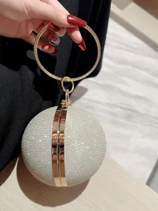 Sac de soirée sphérique brillant avec poignée ronde en métal, magnifique sac à main strass.