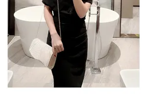 Elegant satin pleated evening bag with chain, stylish clutch for weddings and parties.