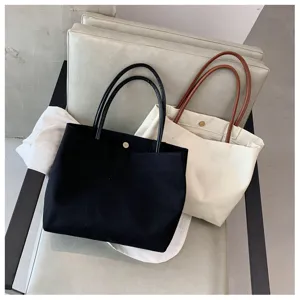 Sac cabas en toile de grande capacité, sac à bandoulière quotidien simple pour femme.