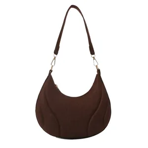 Brown French underarm shoulder bag with textured crescent design, stylish and versatile.