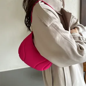 Pink pleated underarm bag detail shot, French style chic single shoulder bag for women daily commuting.