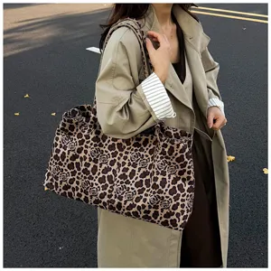 Large capacity leopard print canvas tote bag for women, casual stylish commuter handbag.