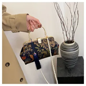 Exquisite Chinese style embroidered evening bag with metal handle, pearl strap and tassel.