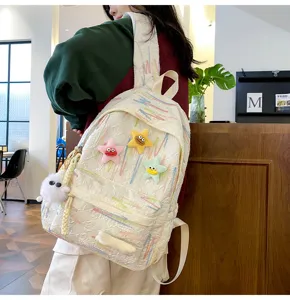 Cute aesthetic backpack for girls high school student cute aesthetic quilted school bag with plush charms