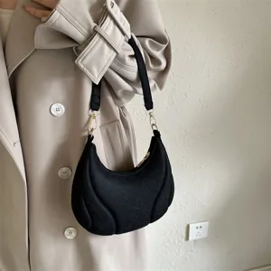 Chic black french hobo shoulder bag with stylish quilted design for women daily commutes.