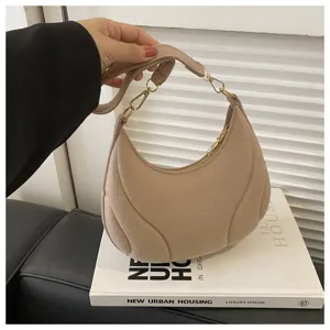 Khaki suede crescent shoulder bag for women, chic French style underarm bag with trendy metal chain.