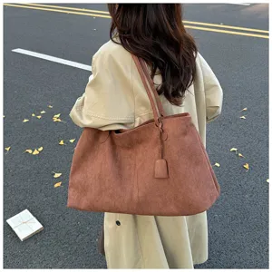 Stylish brown suede tote bag for women, large capacity shoulder bag for daily commute and casual use.