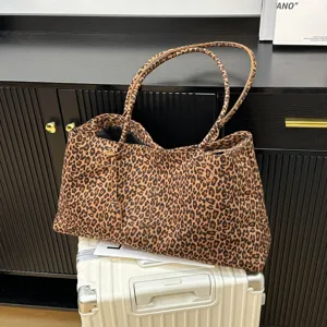 Large capacity leopard print tote bag for women, stylish casual shoulder handbag for daily commute.