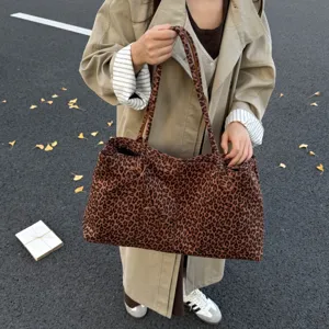 Large capacity leopard print tote bag for women, stylish casual shoulder and handbag for daily use.