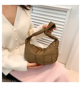 Brown quilted puffer shoulder bag for women, stylish down underarm bag for autumn and winter.