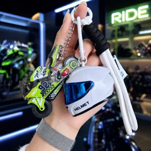Creative motorcycle helmet keychain pendant set, cool metal and plastic bag accessory for keys.