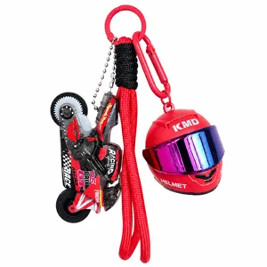 Creative motorcycle helmet keychain backpack pendant toy set with colorful visor and lanyard.